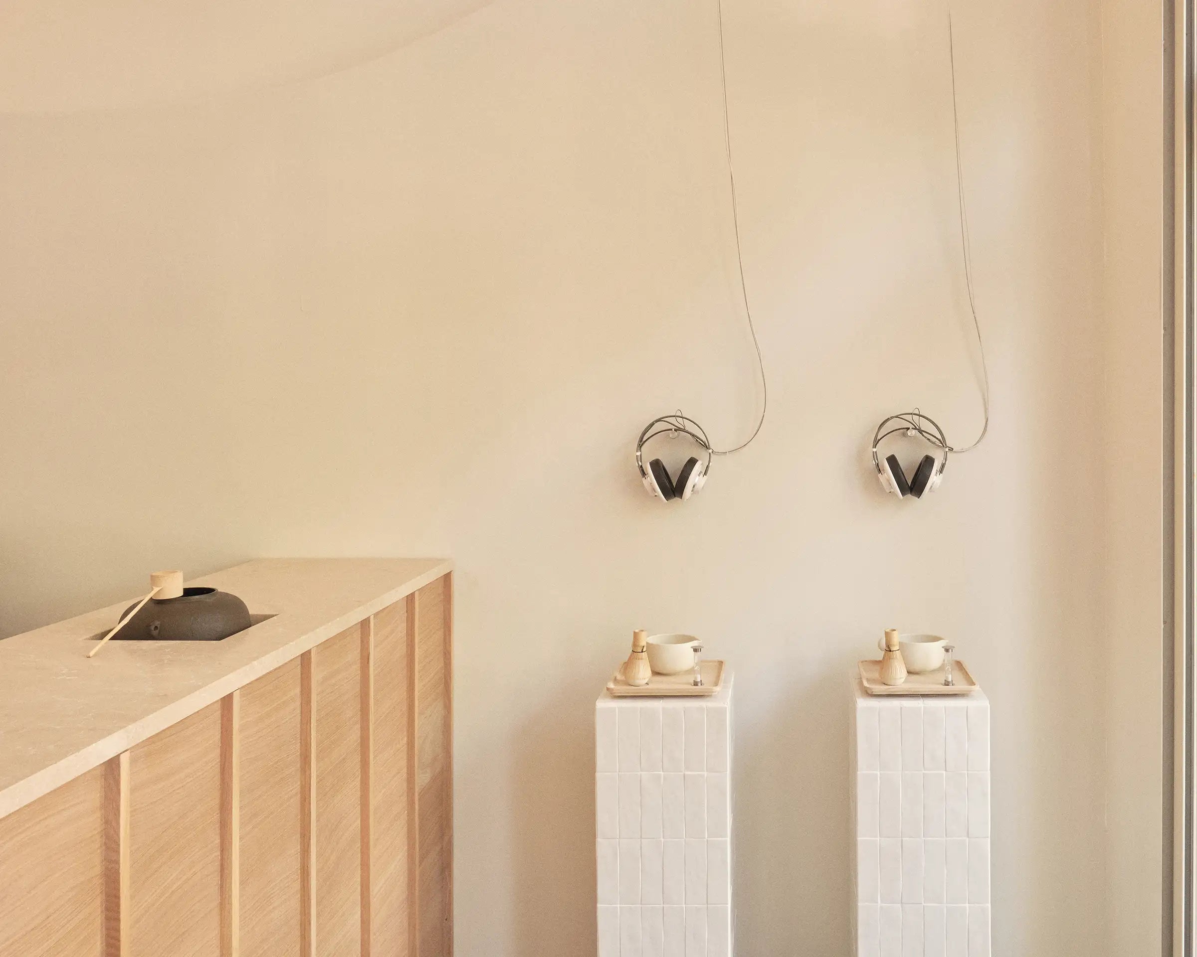 Headphones and matcha whisking stations at Wasui Rotterdam